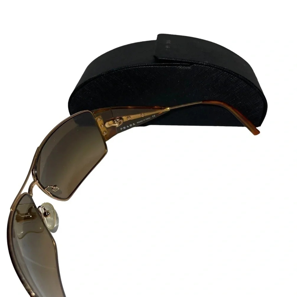 Prada Women Glasses